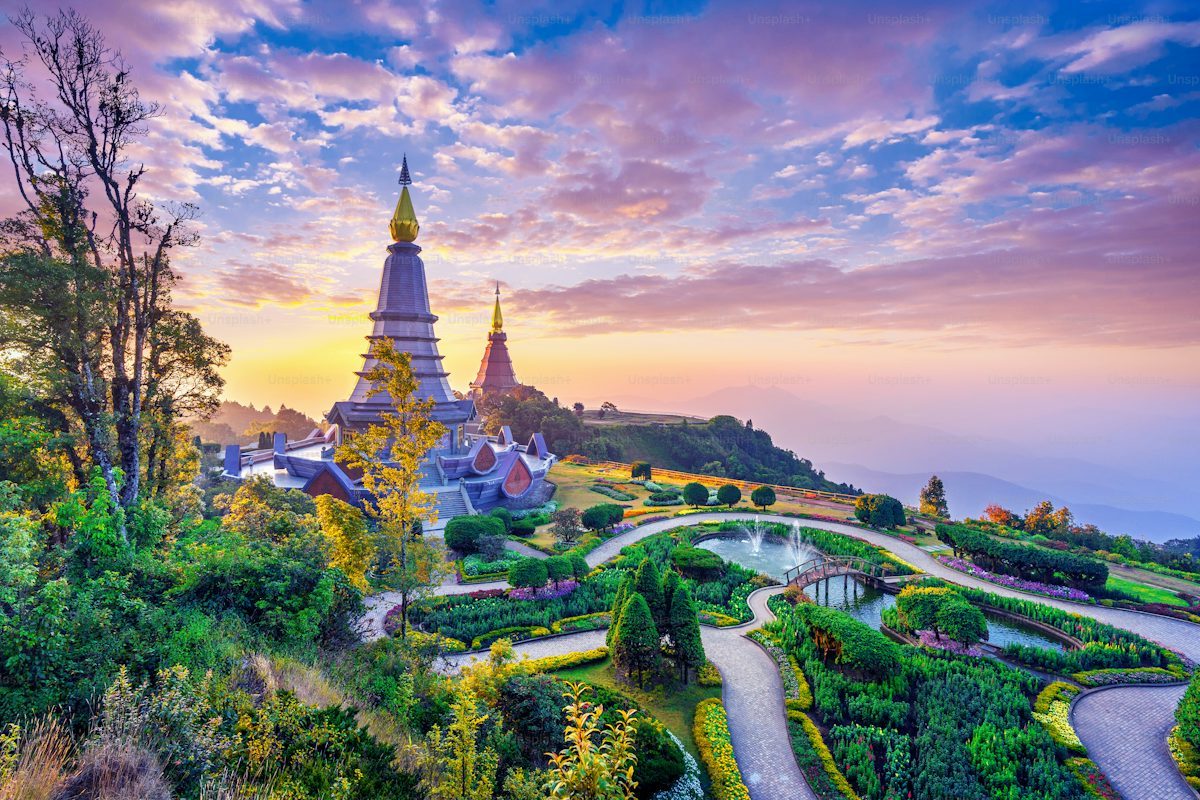 A temple above the treeline in Bali at sunrise