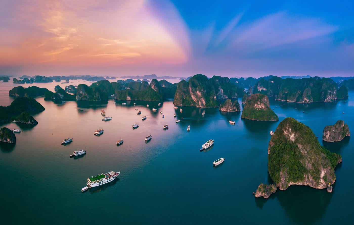 Limestone islands at sunset in Ha Long Bay